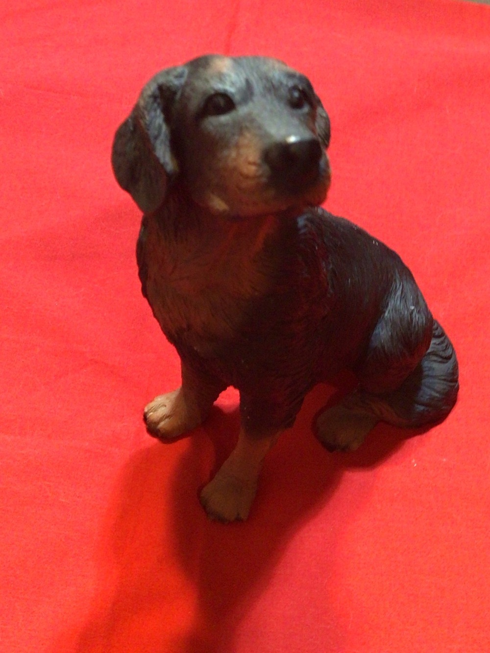 Realistic Black and Brown Sitting Dog Figurine for Display Resin